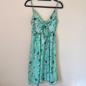 Flowing, midi length floral dress.